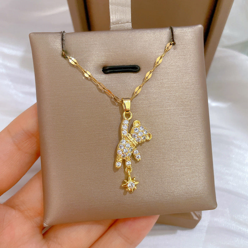 Collana con ciondolo a orso minimalista Starburst in acciaio inossidabile con intarsio di strass per donna e uomo, delicata catena clavicolare