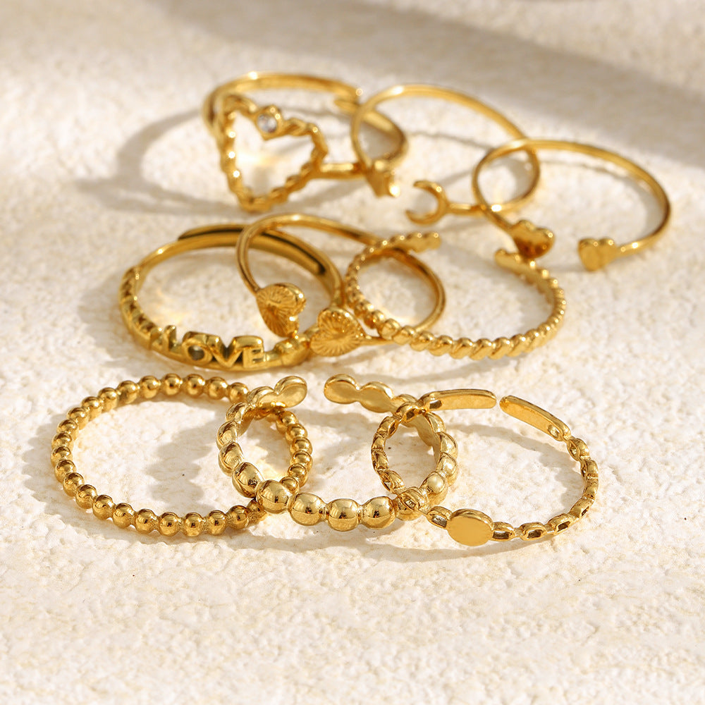 Anillo abierto minimalista de acero inoxidable chapado en oro de 18 quilates con corazón de circonita