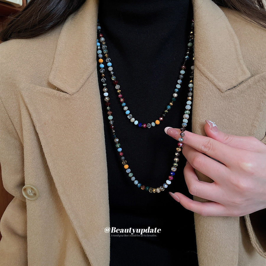 Collana da donna bohémien etnica geometrica con perline e dettagli in cristallo