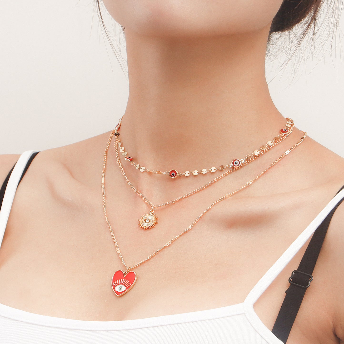 Minimalist Geometric Evil Eye Pendant Necklace for Women with Alloy Body and Gold Plating, Multi-Layer Clavicle Chain Design
