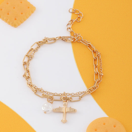Pulsera de doble capa con colgante de avión geométrico para niños, chapada en aleación con detalles de diamantes de imitación