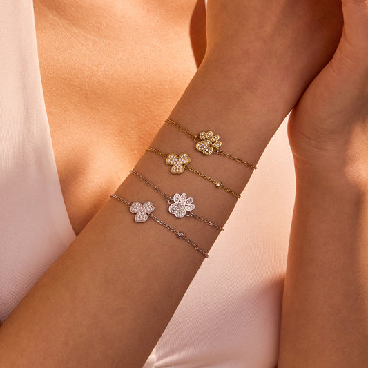 Pulsera de acero inoxidable chapado para mujer con diseño de pata de perro floral minimalista, diseño geométrico y acabado de lujo