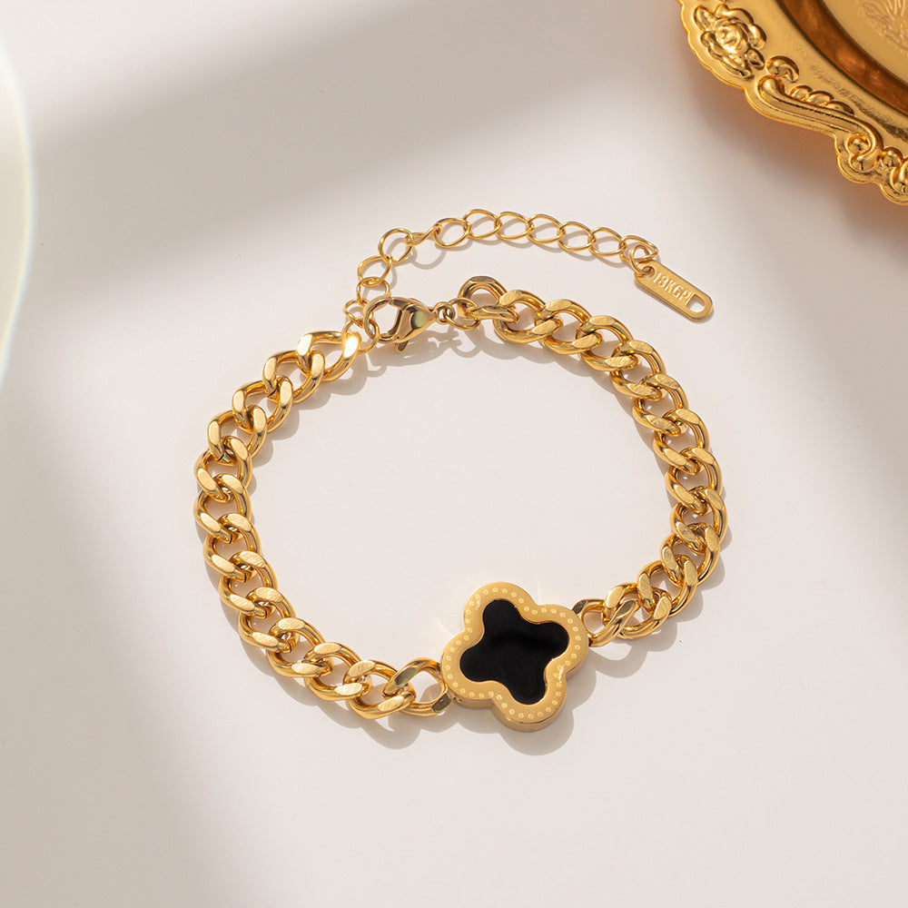 Bracciale da donna alla moda a forma di trifoglio in acciaio al titanio con finitura placcata e design a catena spessa