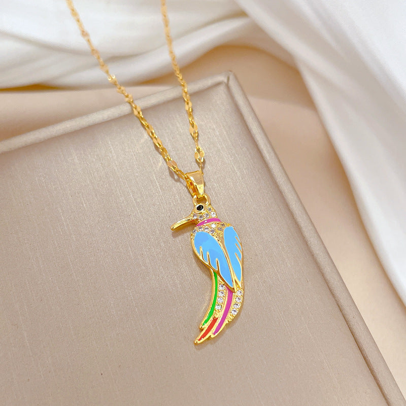 Collana da donna con ciondolo di lusso in smalto a forma di picchio in acciaio al titanio con forma geometrica e motivo a luna su catena a clavicola