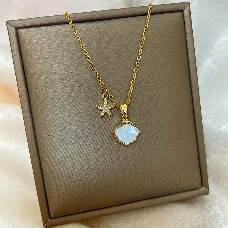 Collana con ciondolo a goccia in rame placcato oro 18 carati con micro-pavé e catena a onda in acciaio al titanio, design originale