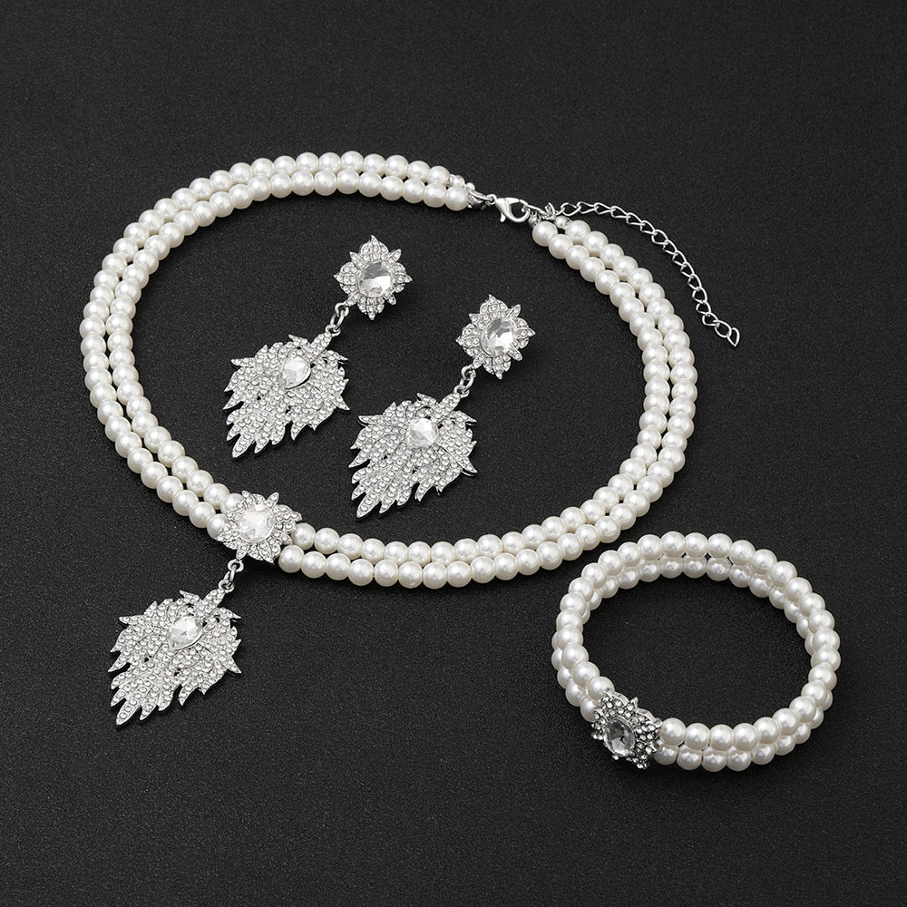 French Vintage Leaf-Shaped Imitation Pearl Necklace Earrings Bracelet Set for Women with Rhinestone Inlay and O-Chain