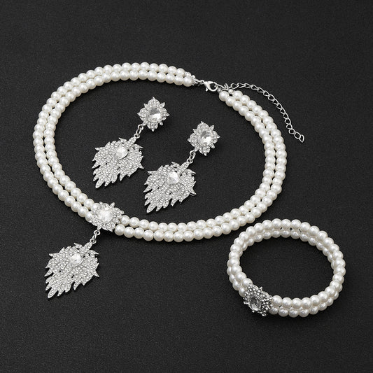 Juego de collar, pendientes y pulsera vintage franceses con imitación de perlas en forma de hoja para mujer con incrustaciones de diamantes de imitación y cadena de eslabones