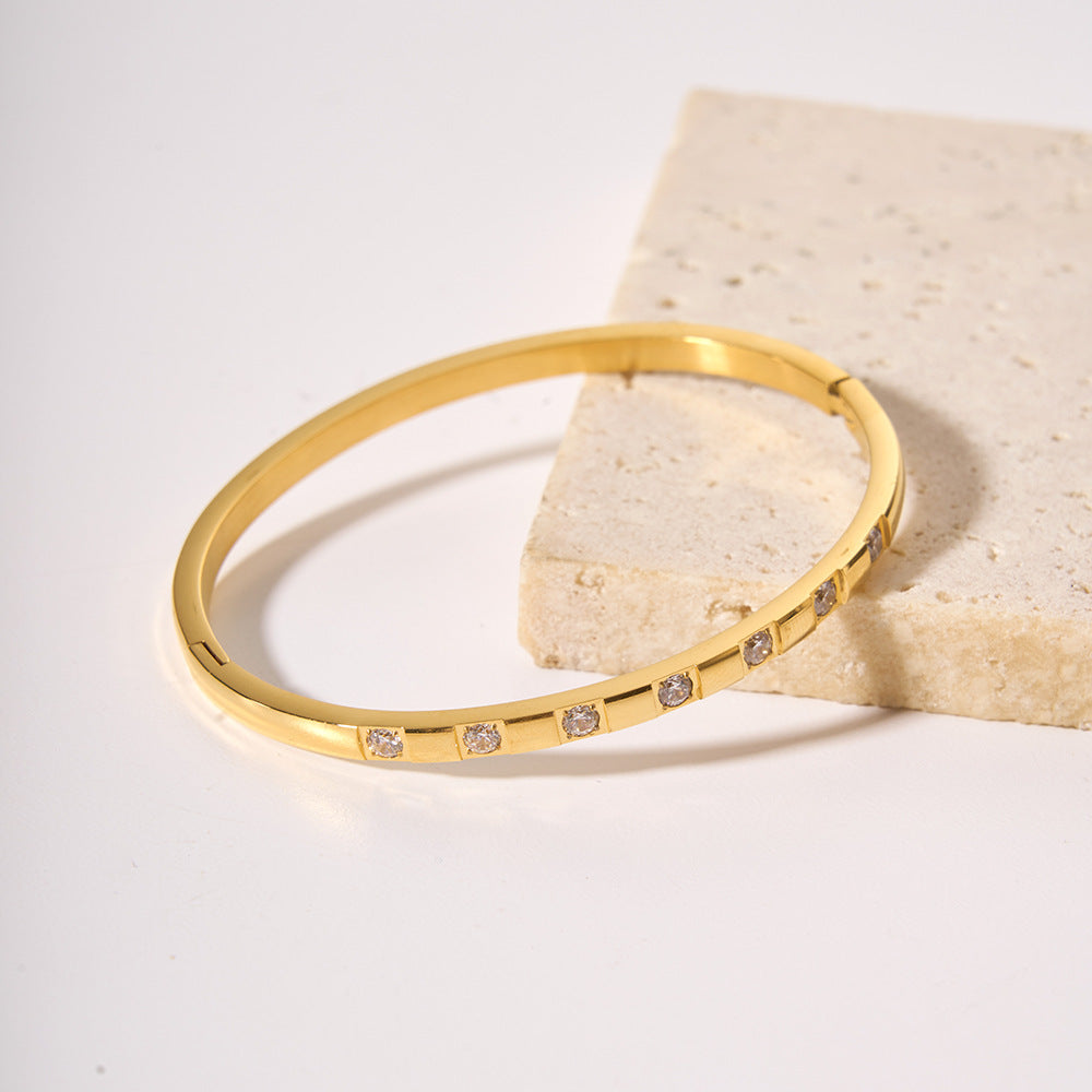 Fashionable 18K Gold Plated Stainless Steel Bracelet with White Zircon Inlay Geometric Ring Design for Women