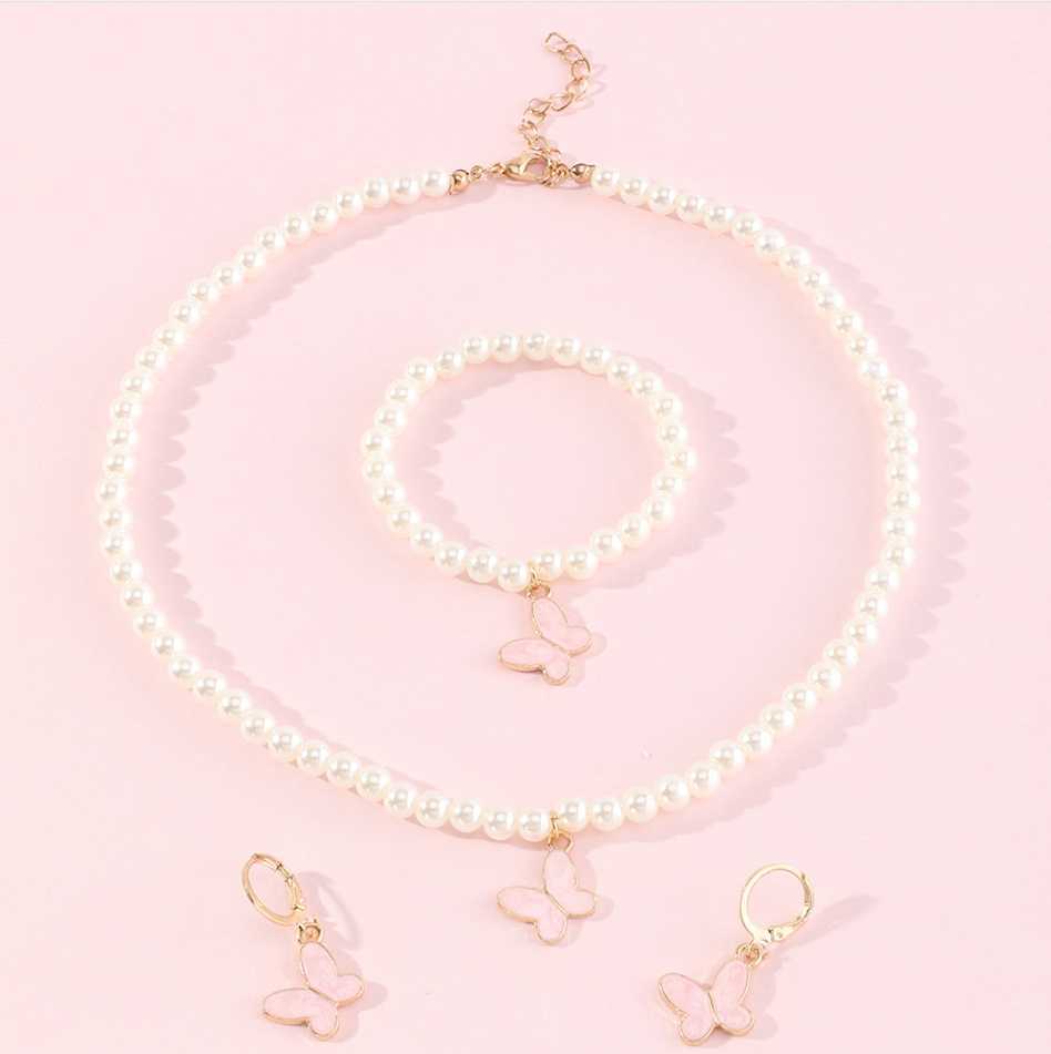 Conjunto Minimalista de Collar con Forma de Lazo de Aleación para Niñas con Detalles de Perlas, Incluye Pulsera, Anillo y Pendientes de Botón