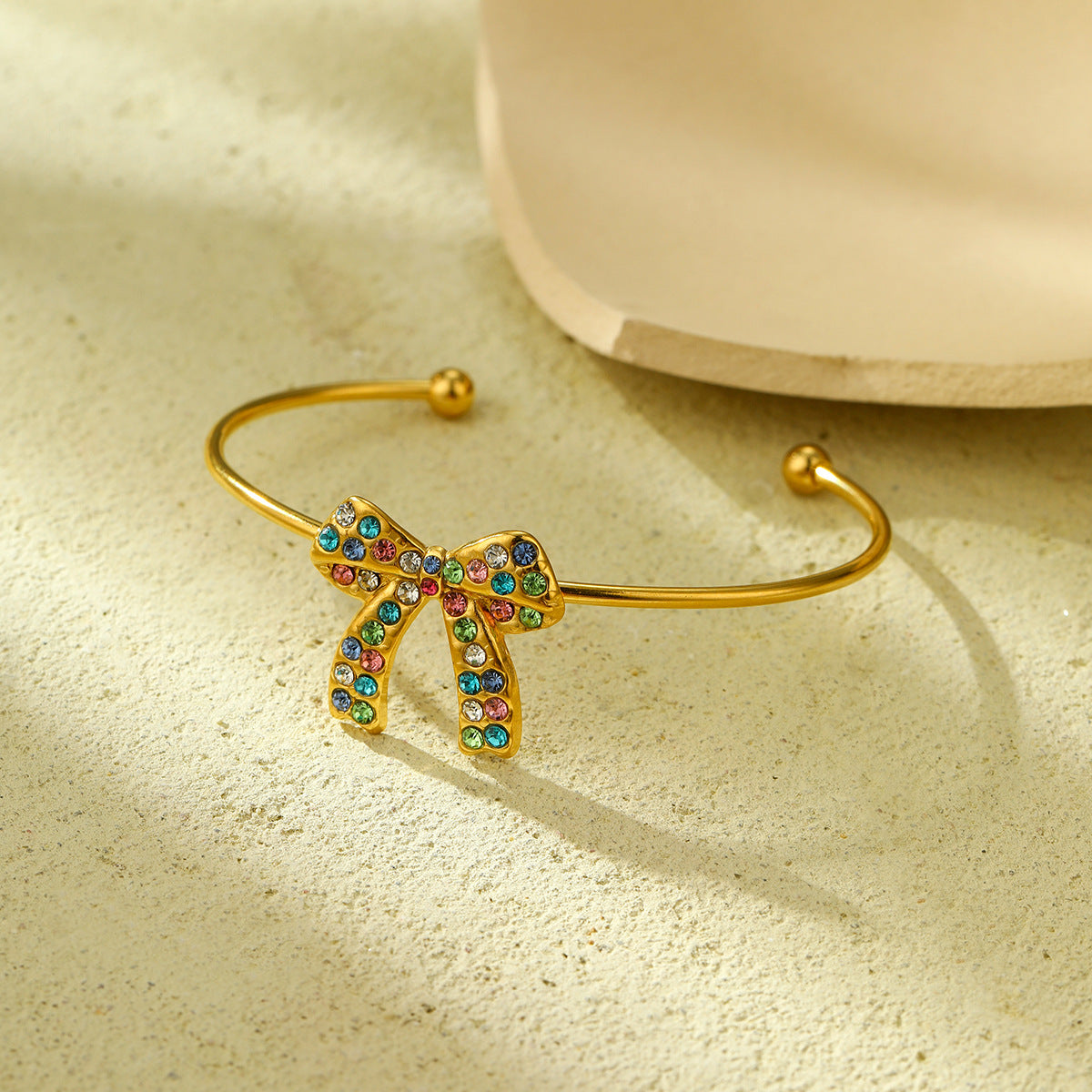 Conjunto de pendientes y collar de acero titanio con lazo de moda para mujer, con acabado chapado y diseño minimalista elegante