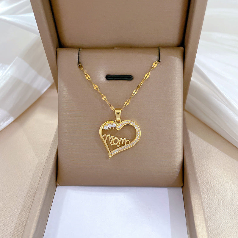 Elegant Hollow Heart Letter Floral Pendant Necklace for Women in Titanium Steel with Rhinestone Inlay and Delicate Clavicle Chain