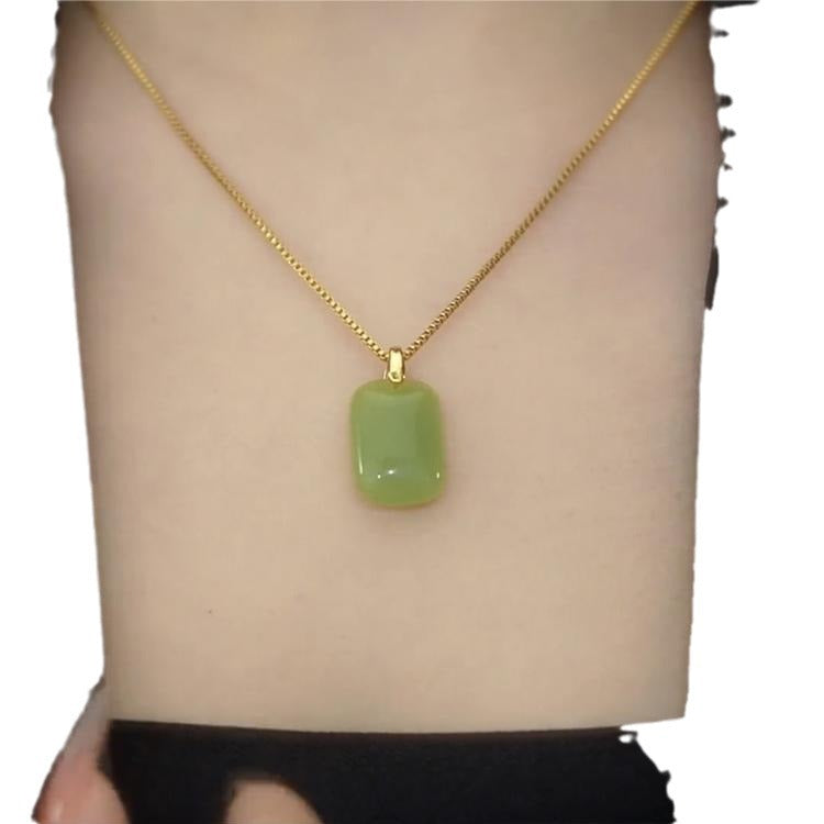 Collana da donna con ciondolo in acciaio al titanio dalla forma irregolare, design originale, con intarsio in lega di rame e finitura placcata