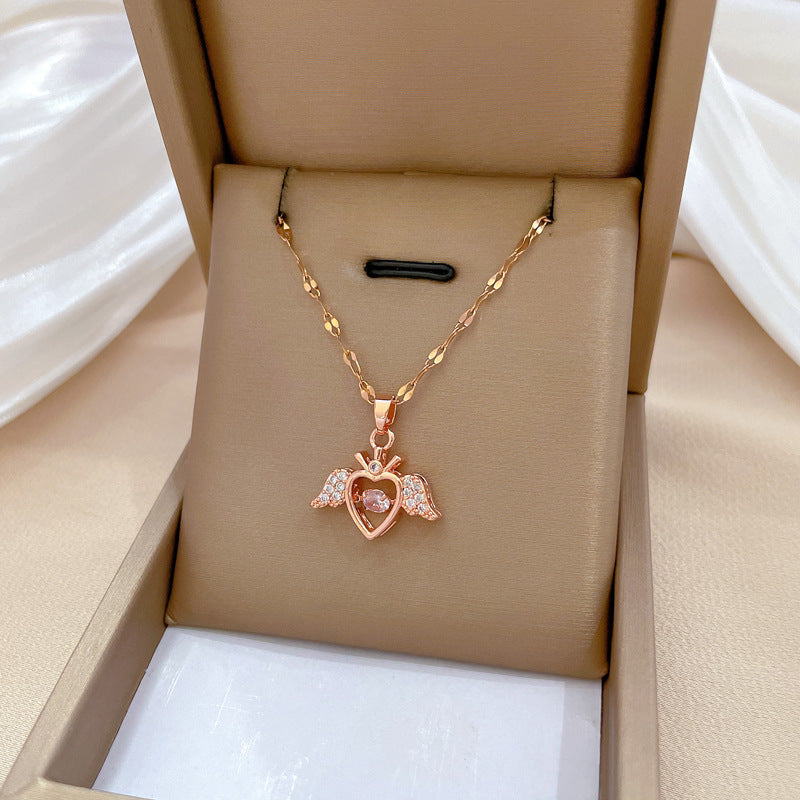 Elegante collana pendente a forma di ala d'angelo per donna, catena in acciaio inossidabile con accenti di strass, look lussuoso e leggero