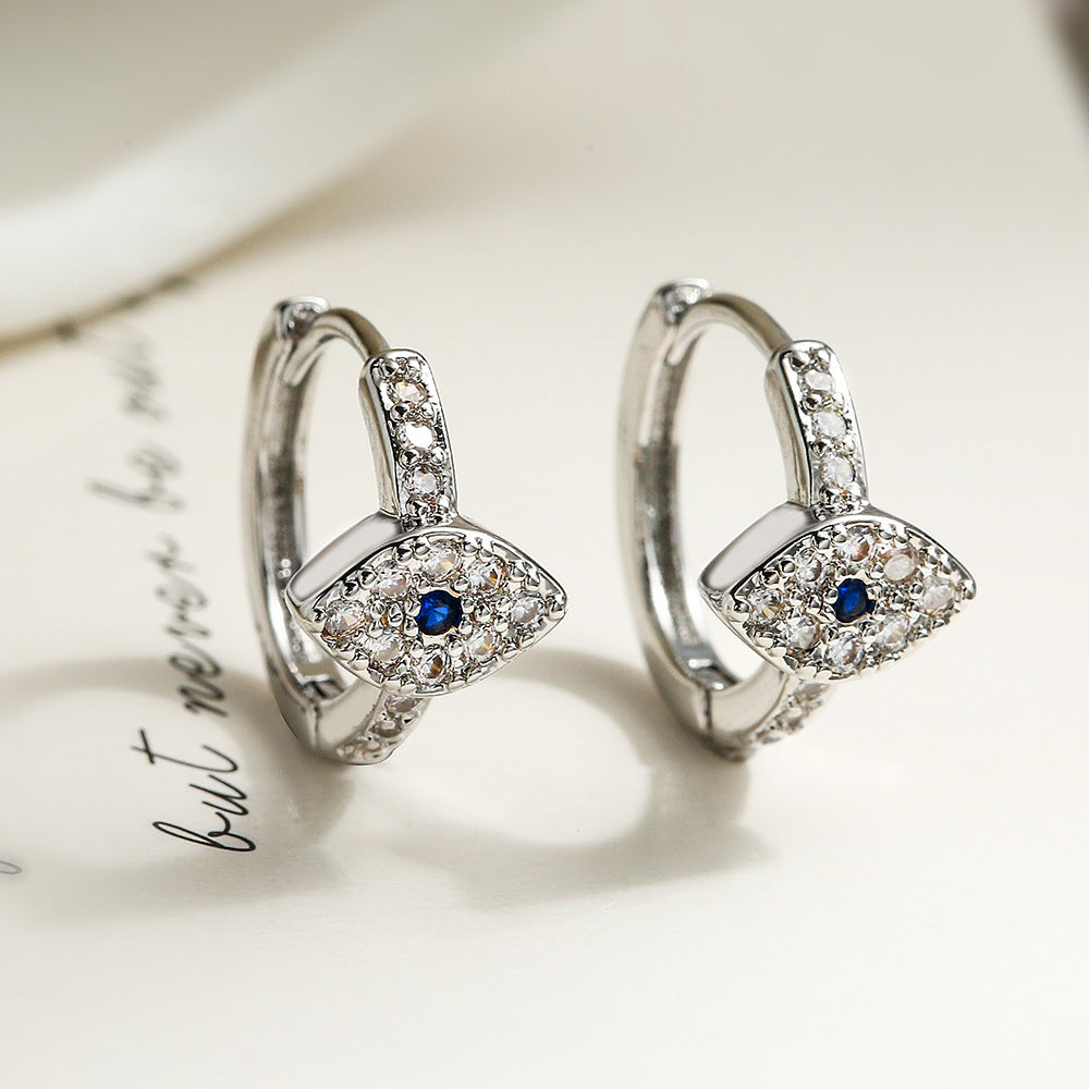 Orecchini a polsino minimalisti geometrici in rame con placcatura in oro e design a occhio di zircone da donna