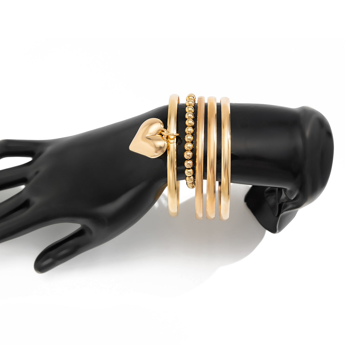 Set di bracciali con ciondolo a forma di cuore minimalista e perline di metallo placcato, per essere indossati in modo impilabile