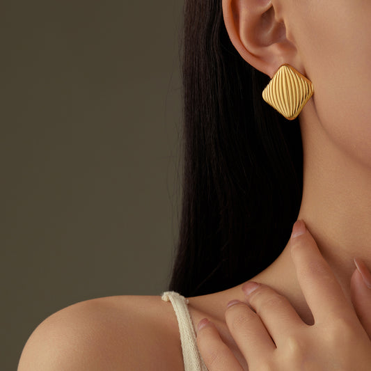 Pendientes de aro geométricos vintage de acero inoxidable con textura de onda y diseño hueco para mujer