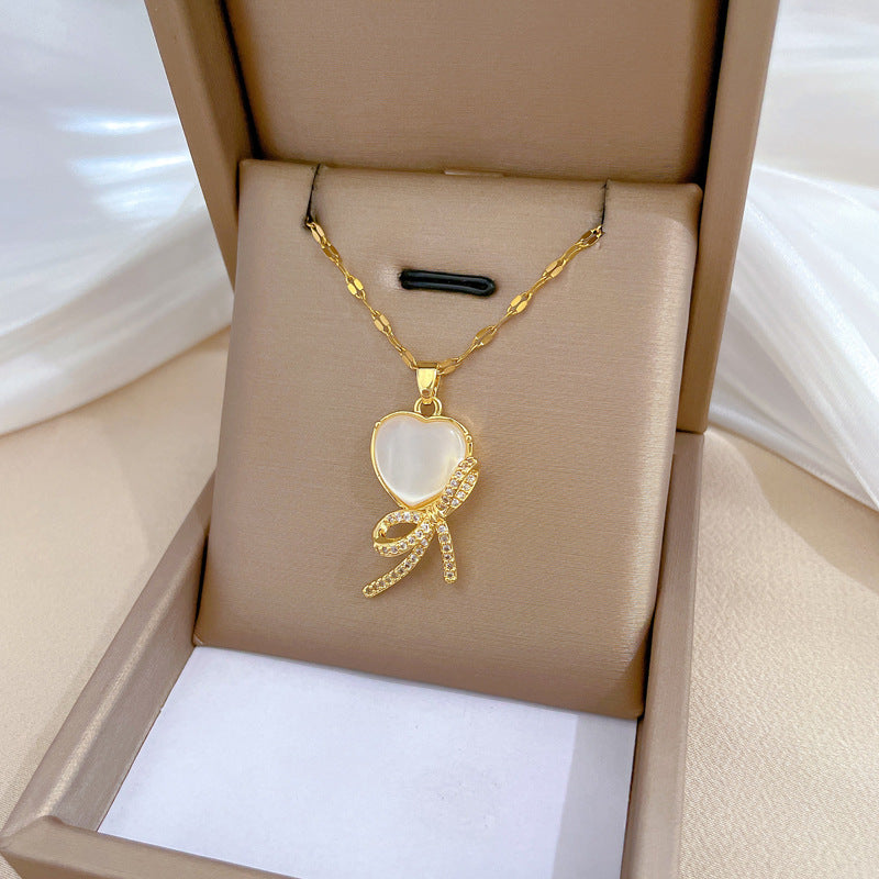 Minimalist Bowknot Pendant Necklace for Women Stainless Steel Chain with Rhinestone Inlay and Moon Motif