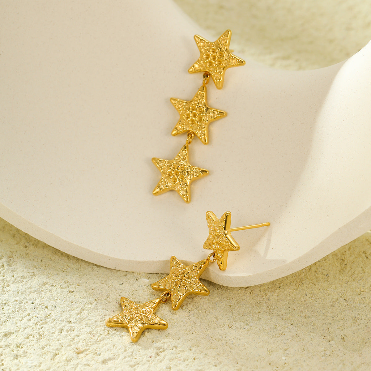 Pendientes de mujer de acero inoxidable vintage con textura martillada, diseño de estrella y borlas