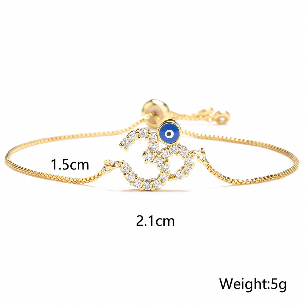 Bracciale da donna regolabile a catena in rame con placcatura in oro 18 carati e zirconi micro-pavé, design geometrico