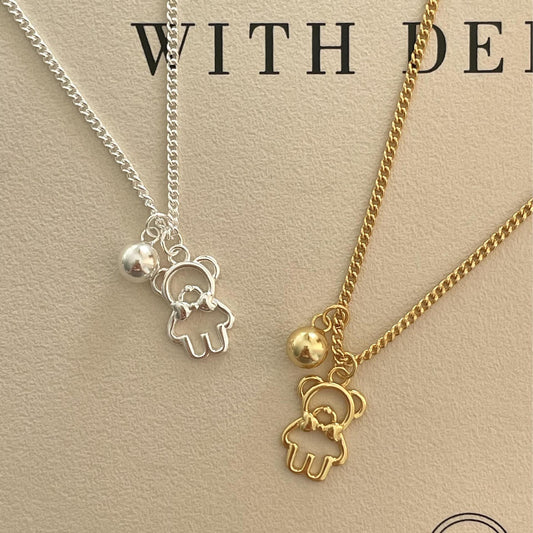 Collar con colgante de oso minimalista de plata de ley 925 con baño de oro en cadena cruzada para mujer