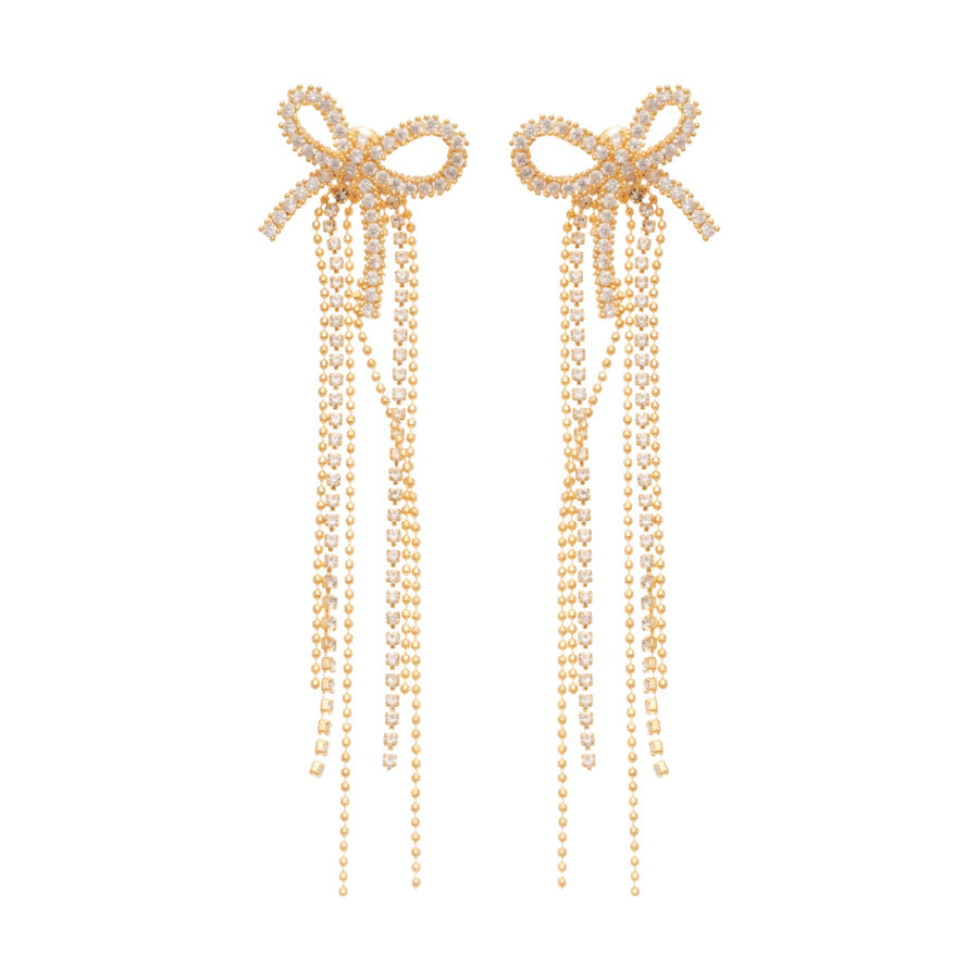 Pendientes de botón retro elegantes con lazo y borla con circonitas cúbicas en cobre y acero para mujer