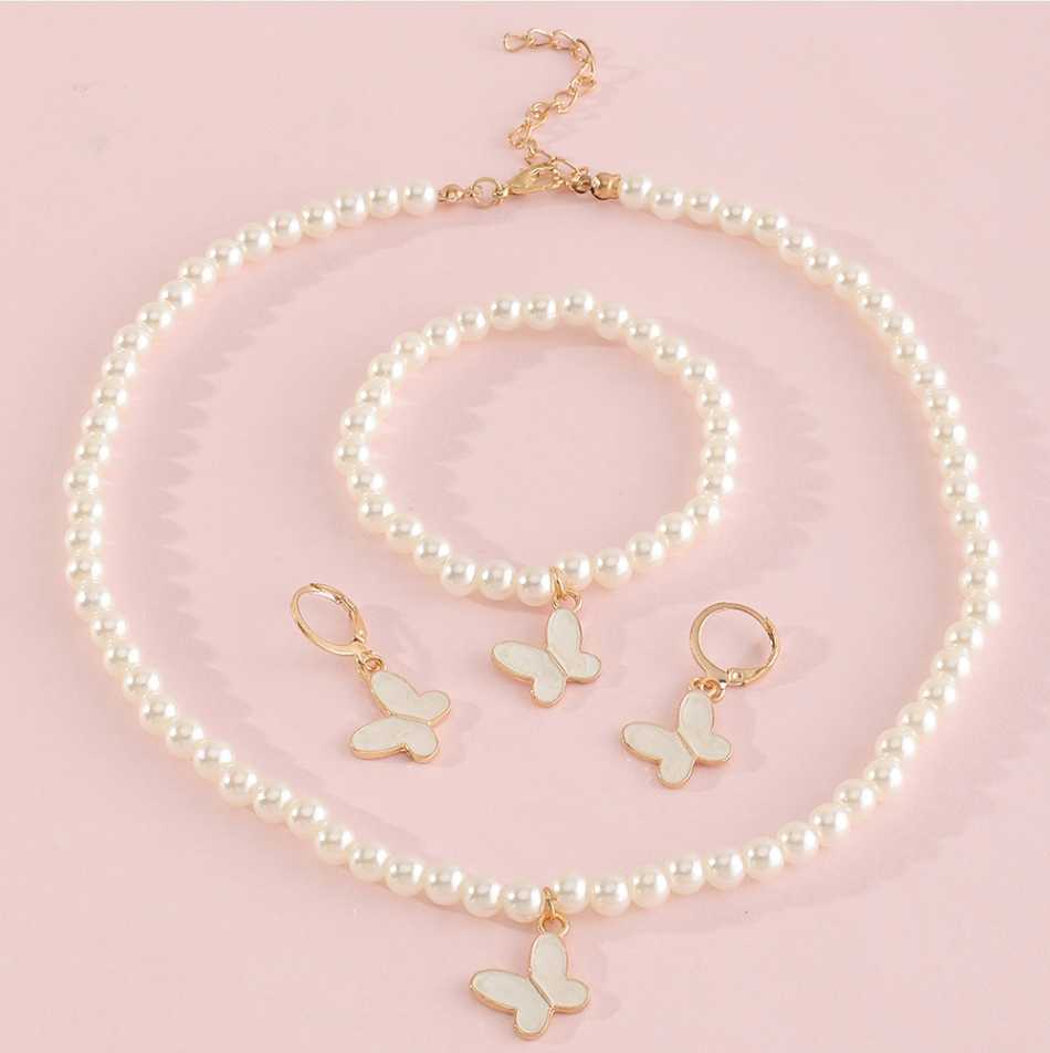 Conjunto Minimalista de Collar con Forma de Lazo de Aleación para Niñas con Detalles de Perlas, Incluye Pulsera, Anillo y Pendientes de Botón