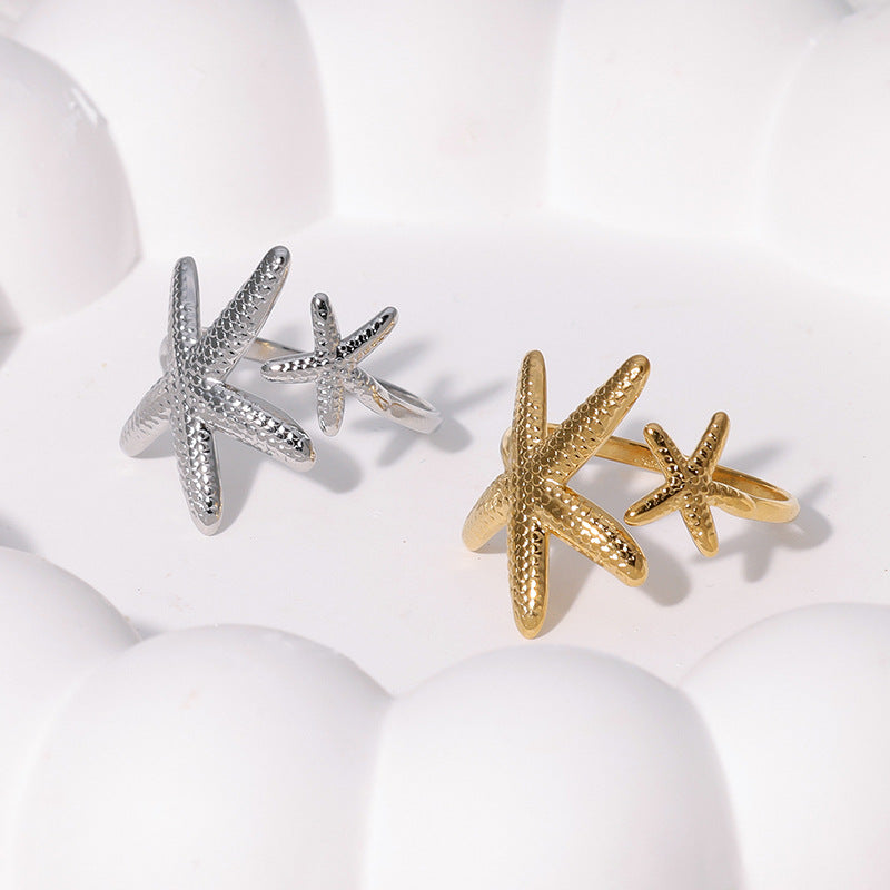 Elegante anello regolabile da donna in acciaio inossidabile a forma di stella marina con finitura placcata, gioiello da spiaggia ispirato all'oceano