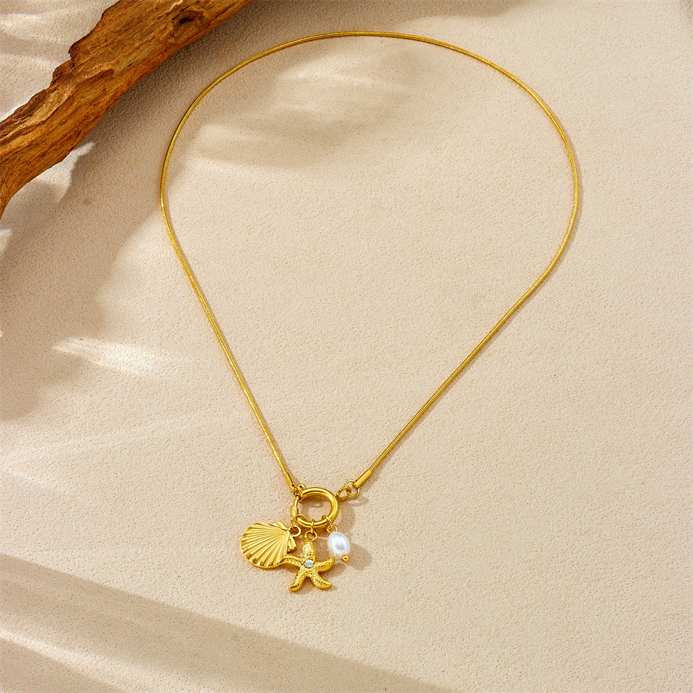 Collana da donna con ciondolo a stella marina e conchiglia, placcata oro su catena snake, in acciaio inossidabile, a tema oceanico