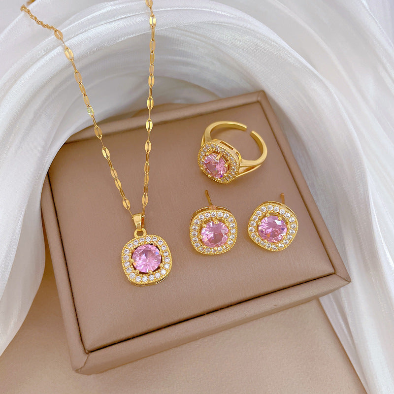 Set di collana, orecchini e anello in acciaio al titanio con design geometrico di lusso
