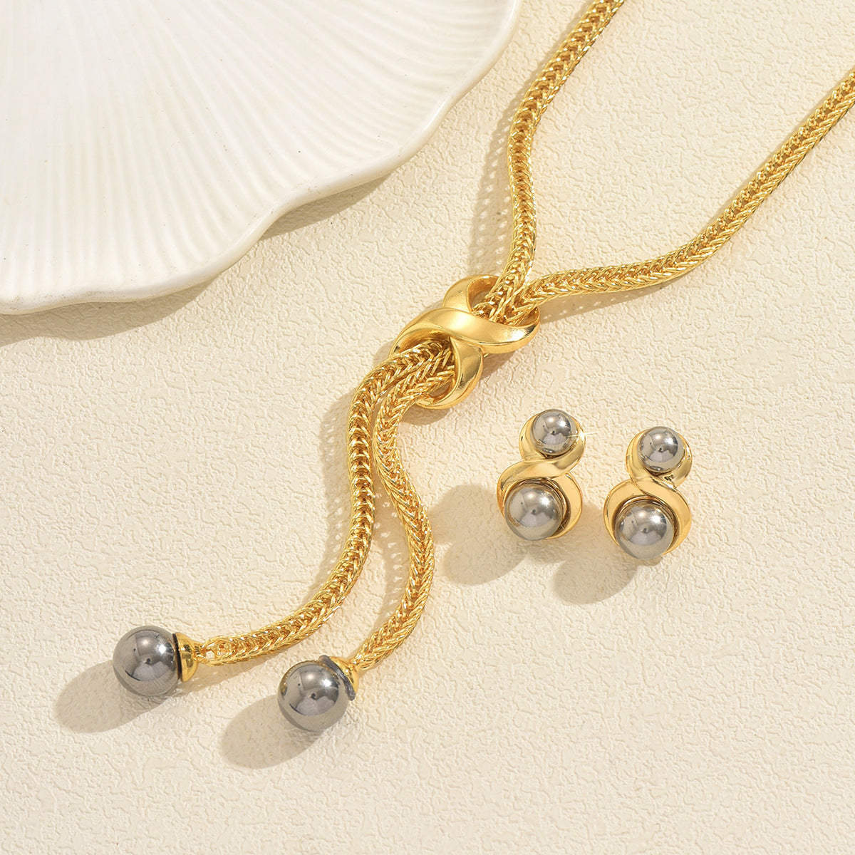 Geometric Pearl-Inlaid Zinc Alloy Necklace and Earrings Set for Women with Circular and Linear Design