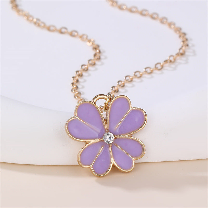 Collar con colgante esmaltado con forma de lazo floral dulce para niñas con dije de aleación y detalles de pedrería