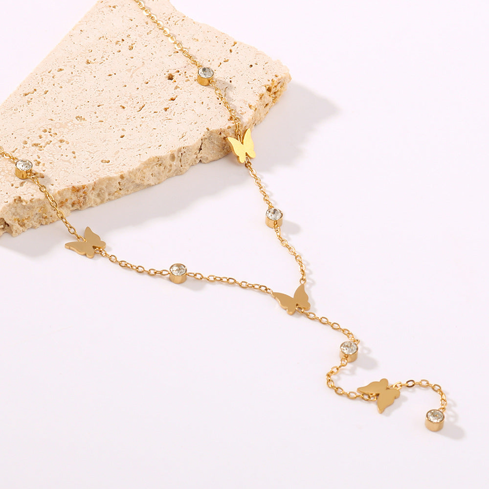 Collana Minimalista con Ciondolo a Farfalla in Acciaio al Titanio Placcato Oro 18K su Catena a O per Donna