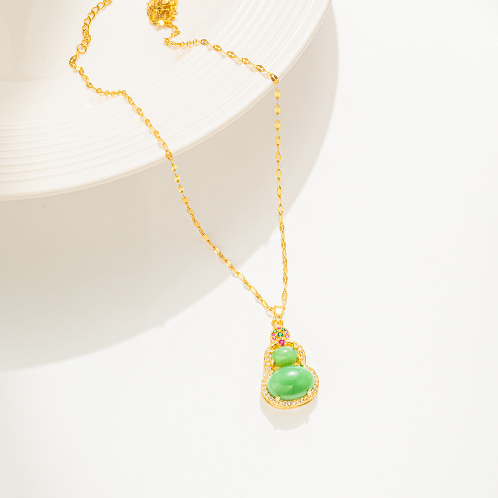 Collana da Donna in Acciaio al Titanio a Forma di Zucca Stile Naturale con Intarsio di Strass e Catena Ondulata