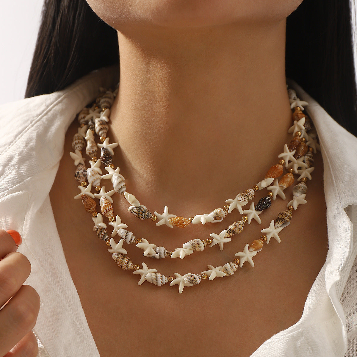 Set di collana con conchiglia a stella bohémien e ciondolo a stella da donna con catena in lega e dettagli in resina