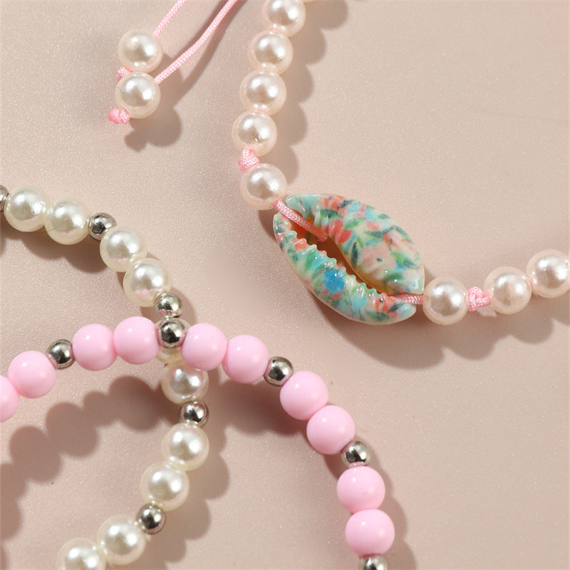 Minimalist Geometric Shell and Acrylic Beaded Bracelet Set for Children with Pink Pearlescent Finish