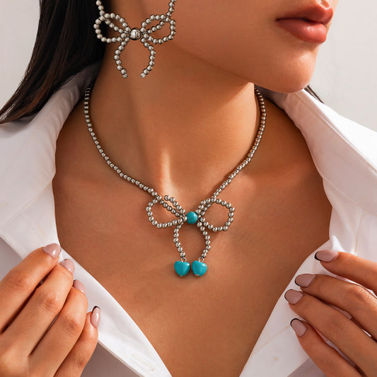 Collar de cadena con lazo vintage y colgante geométrico para mujer, con cadena de clavícula de plástico chapado y resina