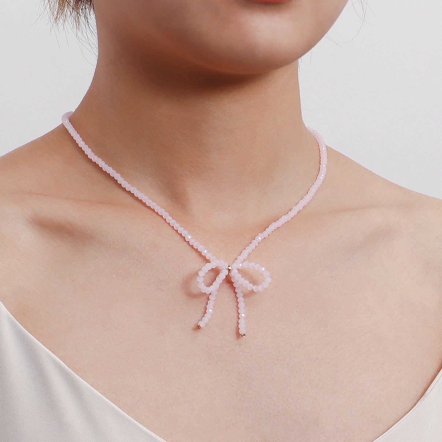 Vintage-Inspired Sweet Bowknot Choker Necklace for Women with Alloy Pendant and Geometric Design, Electroplated Finish