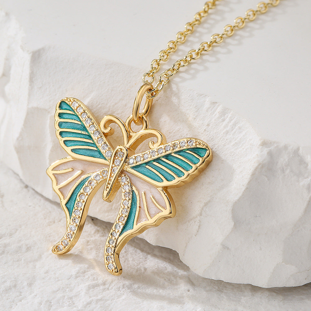 Minimalist Butterfly Pendant Necklace for Women Made of Brass with 18K Gold Plating and Enamel Finish Featuring Cubic Zirconia Inlay