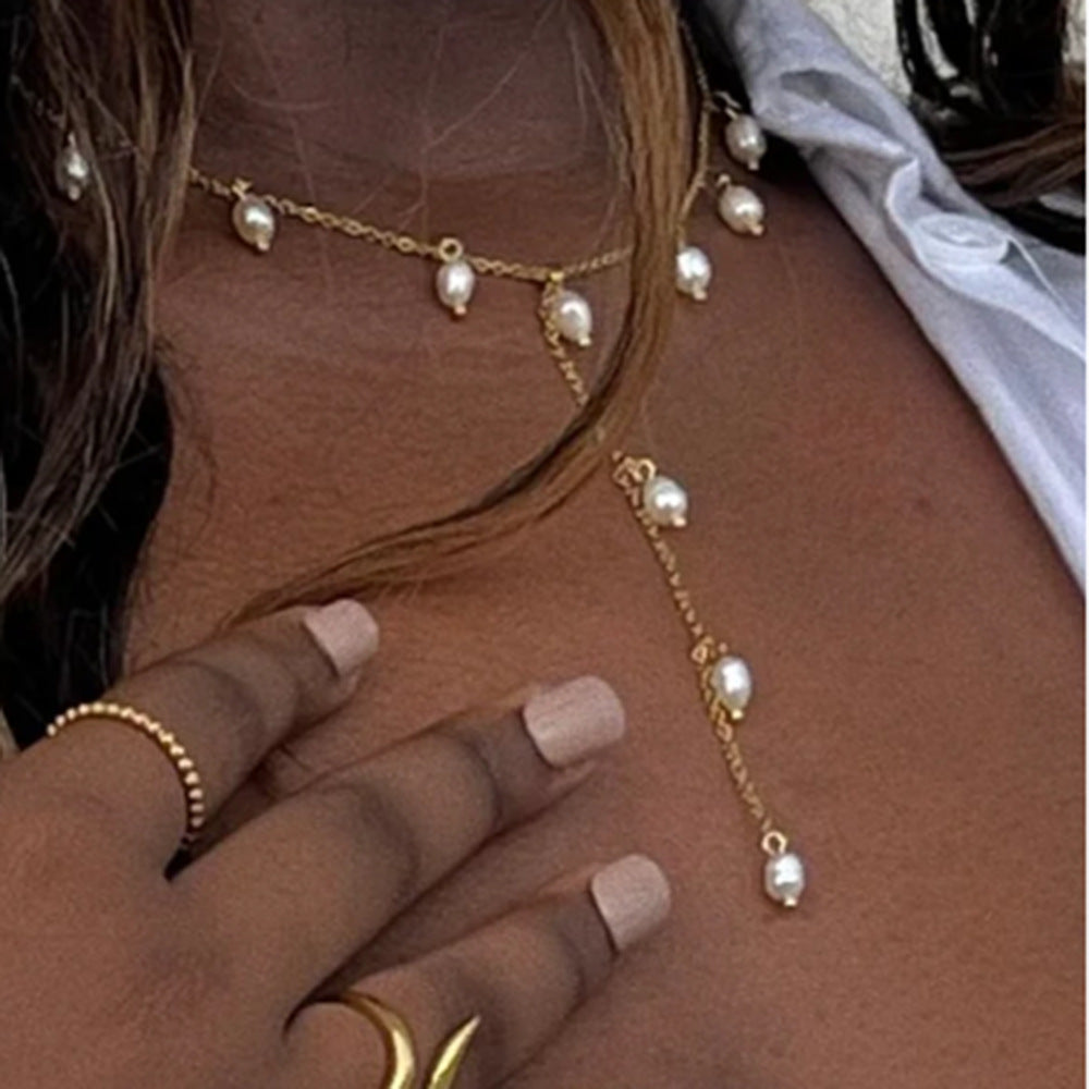 Collana con pendente a croce minimalista da donna in acciaio al titanio placcato, su catena a Y