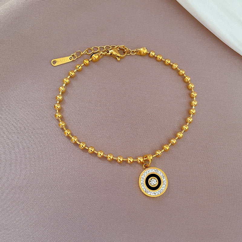 Bracciale ad anello in stile vintage romano da donna in acciaio al titanio con intarsio di strass e trama ondulata