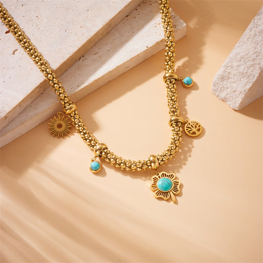 Collana con ciondolo a forma di trifoglio e albero della vita in acciaio inossidabile stile vintage con intarsio in turchese