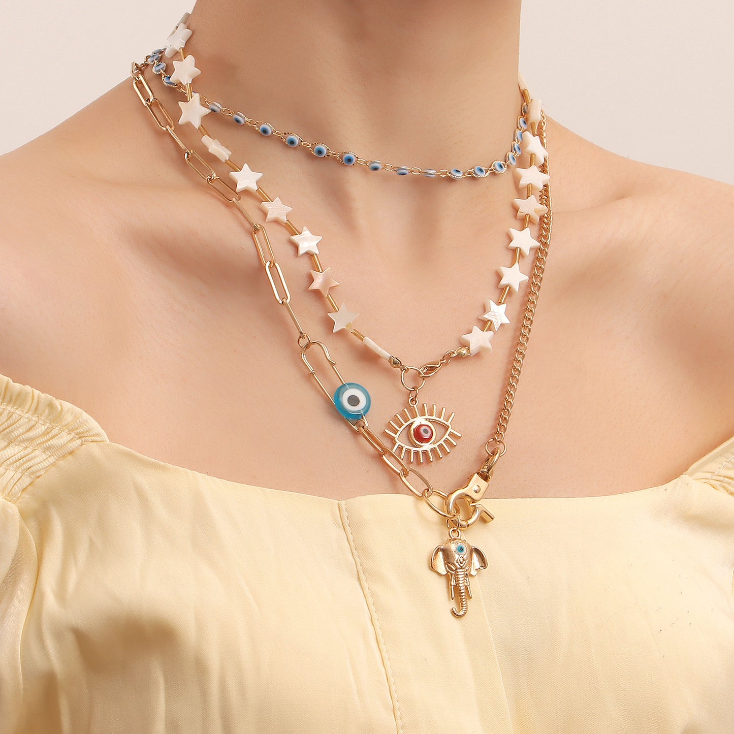 Bohemian Star-Shaped Alloy Pendant Necklace with Evil Eye Charm and Elephant Nose Detail for Women