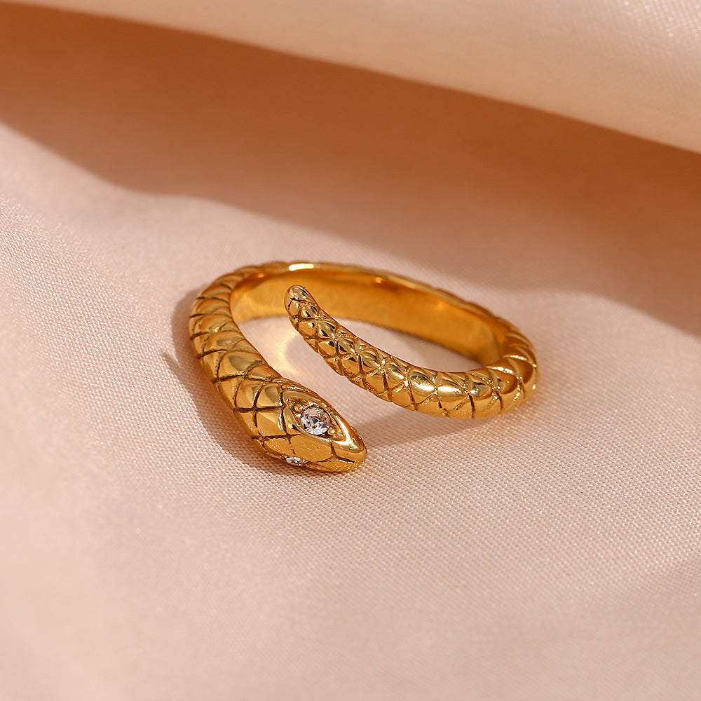 Anello da donna vintage a serpente in acciaio inossidabile placcato oro con strass bianchi