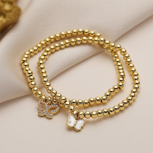 Bracciale elegante a forma di farfalla in rame placcato oro con intarsio di zirconi da donna