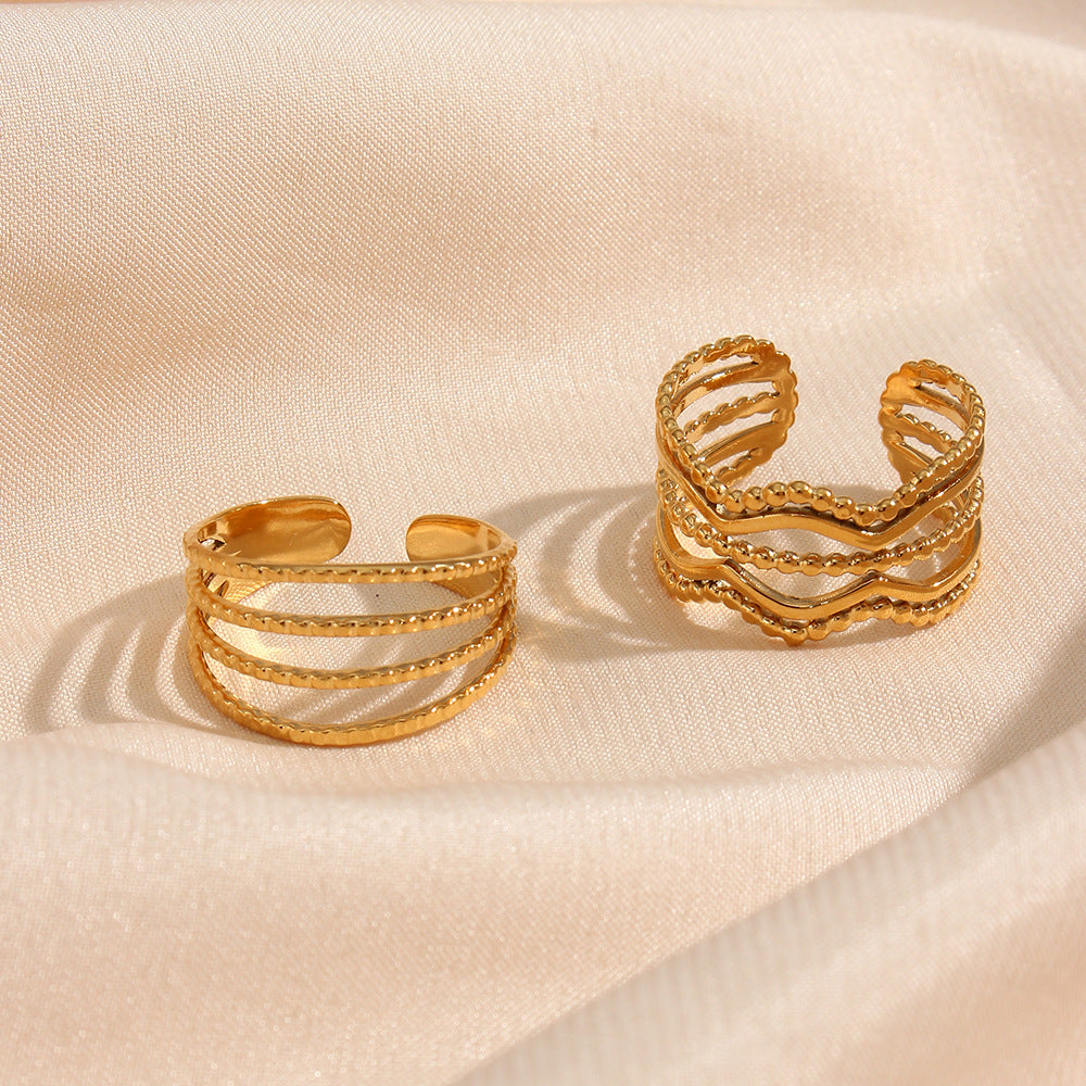 Anillo minimalista geométrico de acero inoxidable con diseño hueco y acabado chapado para mujer