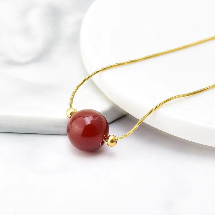 Geometric Titanium Steel Snake Chain Necklace with Gold-Plated Lucky Bean Pendant and Genuine Agate Beads