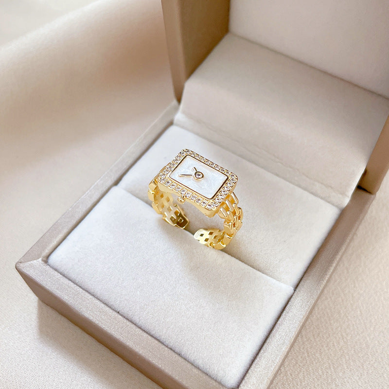 Anillo ajustable minimalista con incrustaciones de diamantes de imitación con diseño de corona para mujer, base de latón con chapado en oro