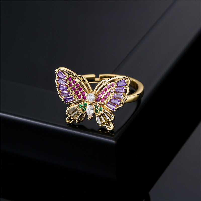 INS Style Geometric Butterfly Ring in Copper with Micro-Paved Cubic Zirconia and 18K Gold Plating