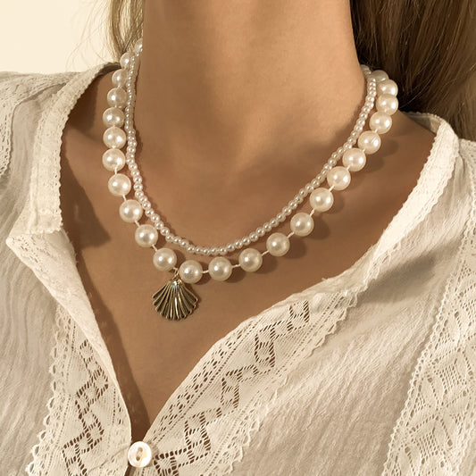 Elegante collar de varias capas inspirado en el océano con concha geométrica y detalles de perlas de imitación para mujer