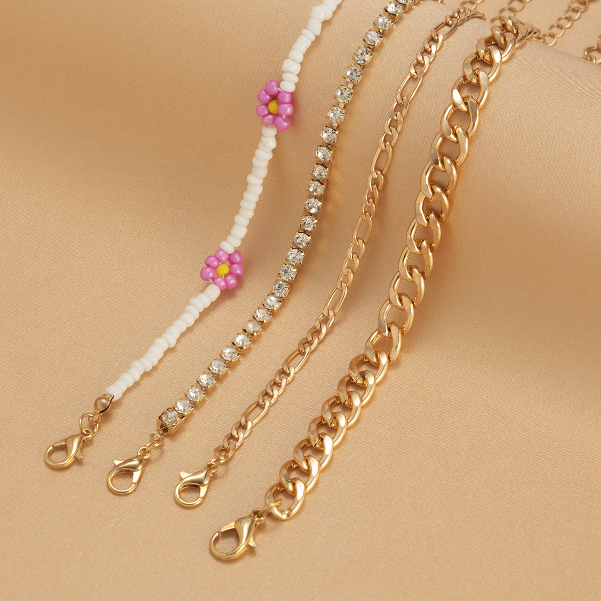 Set di braccialetti con ciondolo a margherita bohémien e catena geometrica cava per donna, gioielli da mano impilabili dolci e audaci